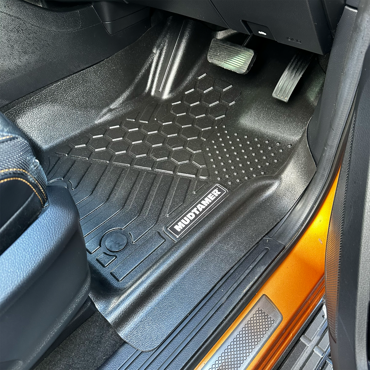 Front driver's MUDTAMER floor mat installed in vehicle