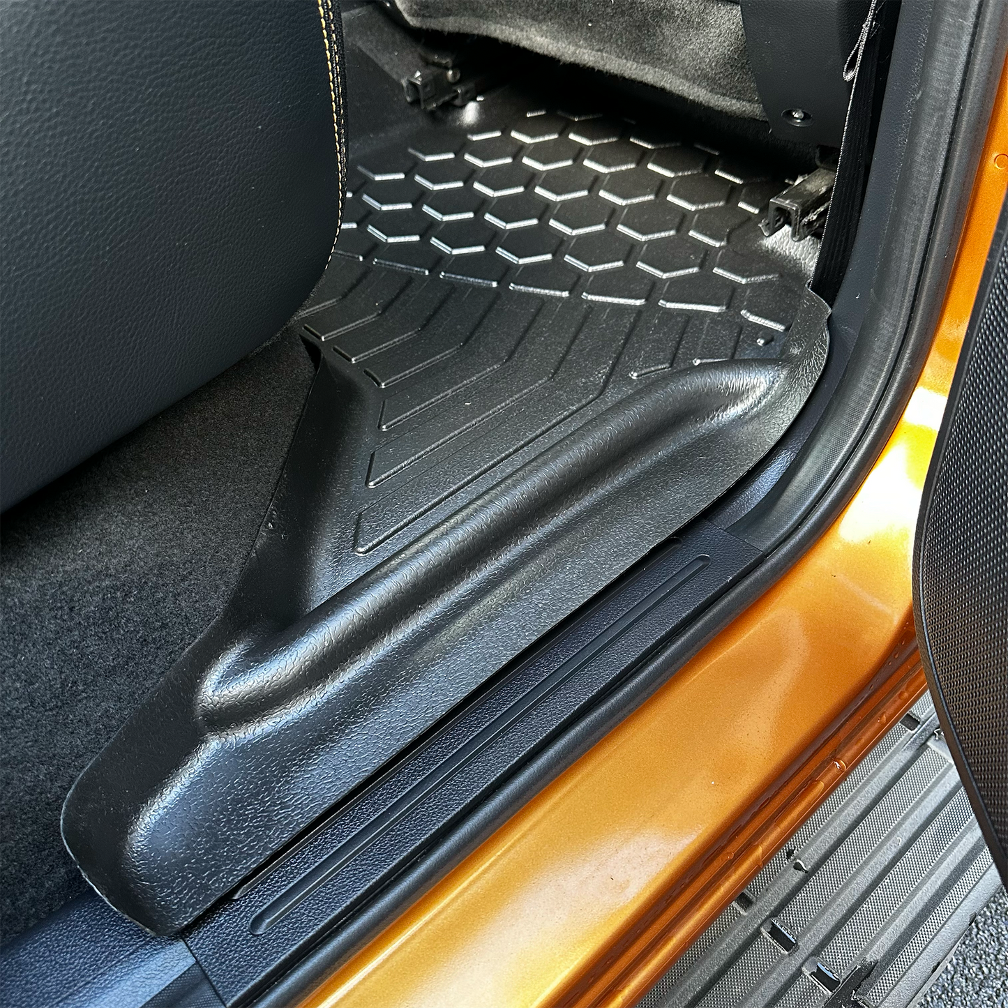 Rear MUDTAMER floor mat installed in vehicle