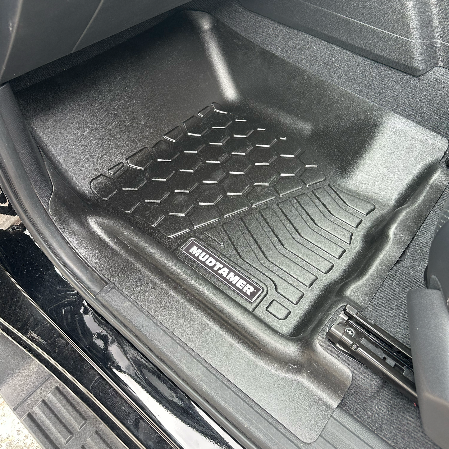 MUDTAMER front passenger side mat installed in a 2024 Mitsubishi MV Triton