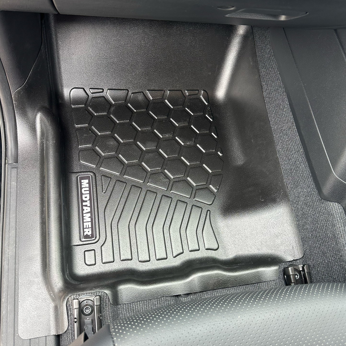 MUDTAMER front passenger side mat installed in a 2024 Mitsubishi MV Triton
