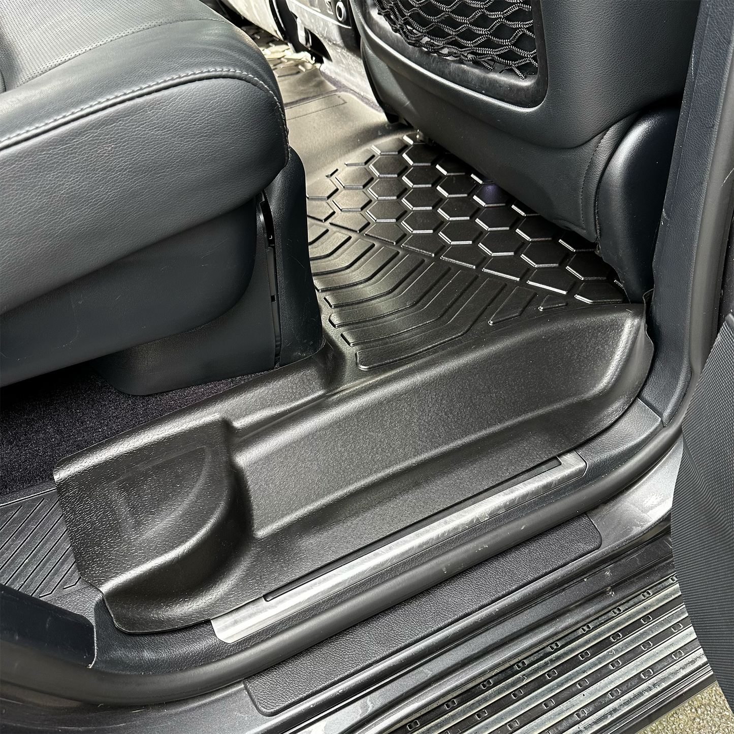 Rear set of MUDTAMER floor mats installed in a Toyota Landcruiser 200 Series