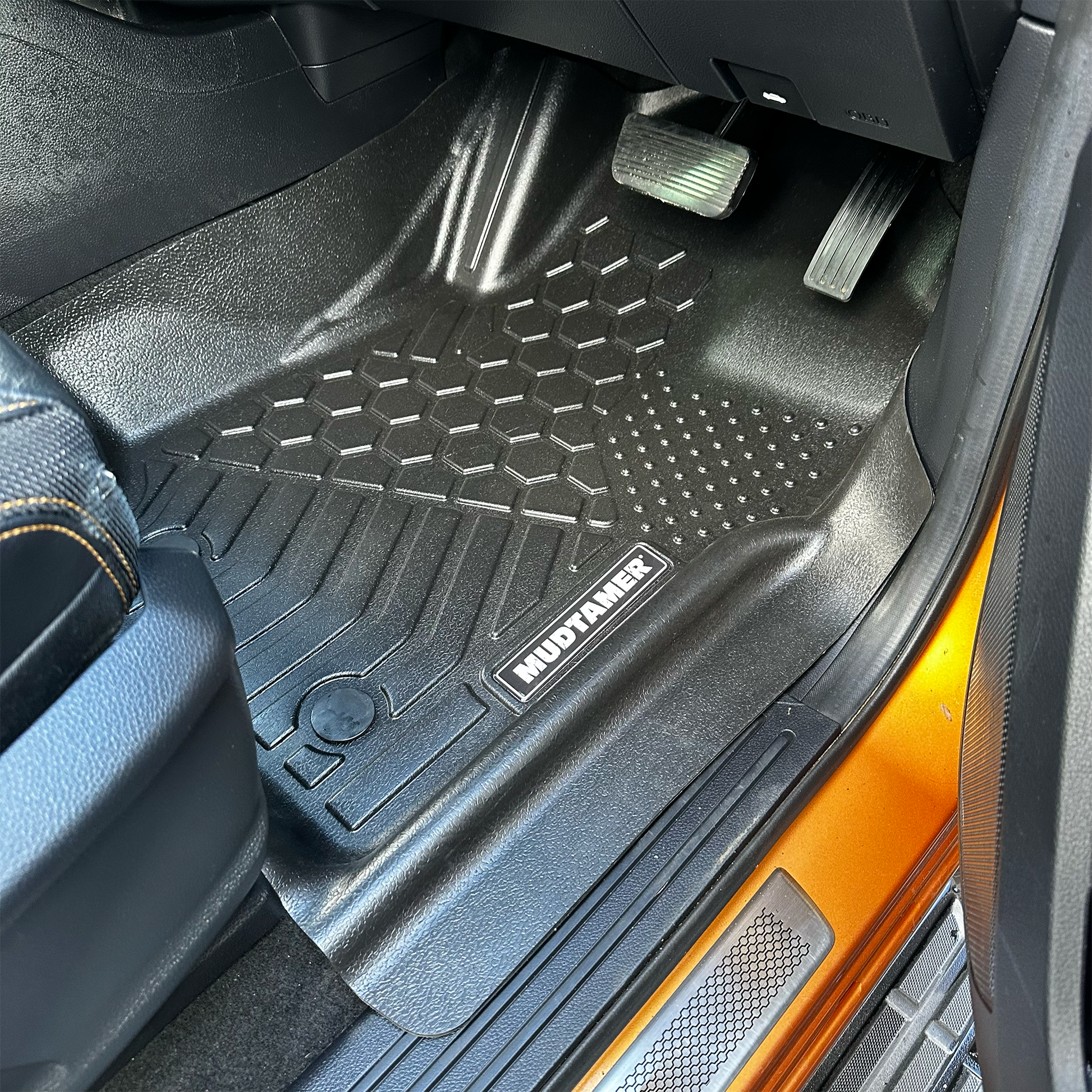 Front driver's MUDTAMER floor mat installed in vehicle