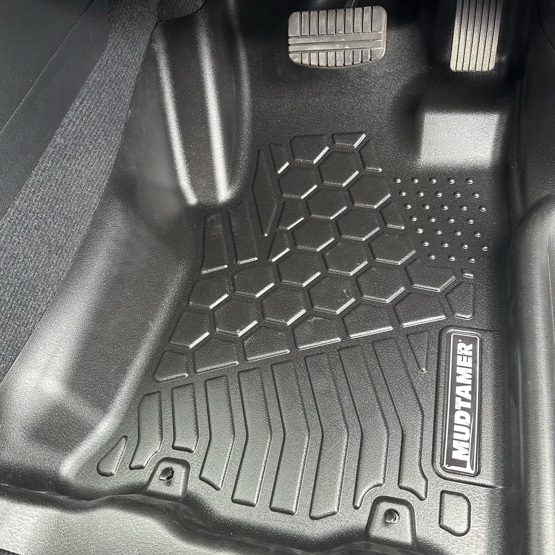 MUDTAMER front driver's side mat installed in a 2024 Mitsubishi MV Triton