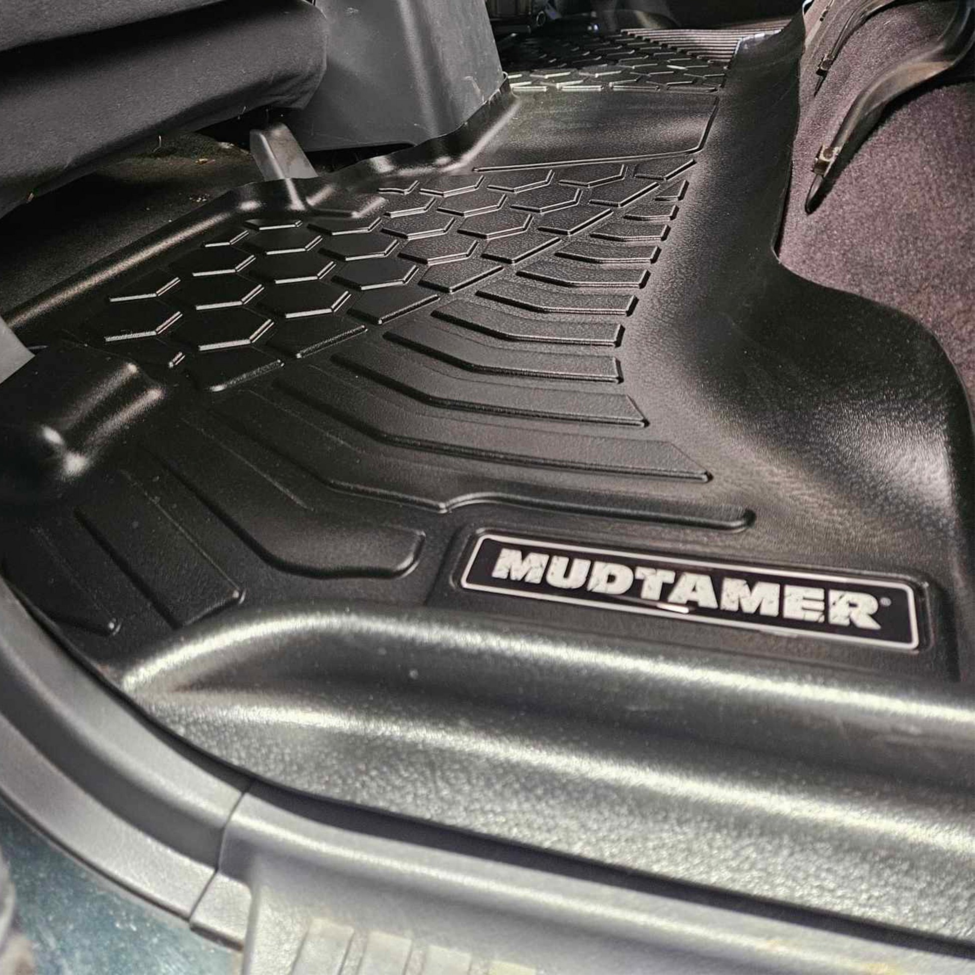 Rear set of MUDTAMER floor mats installed in a Toyota Landcruiser 80 Series